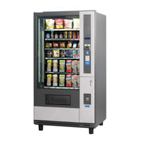 Vendo G-Snack GSF8 + Lift Refurbished snackautomaat in grijs en zilver met spiraalladen, schuin vooraanzicht